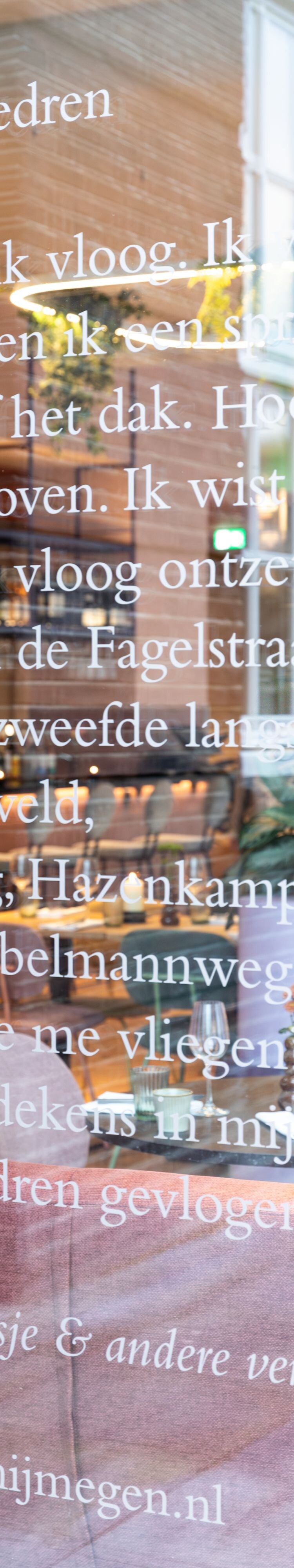 Window at Madame Liberty featuring Dutch Poem