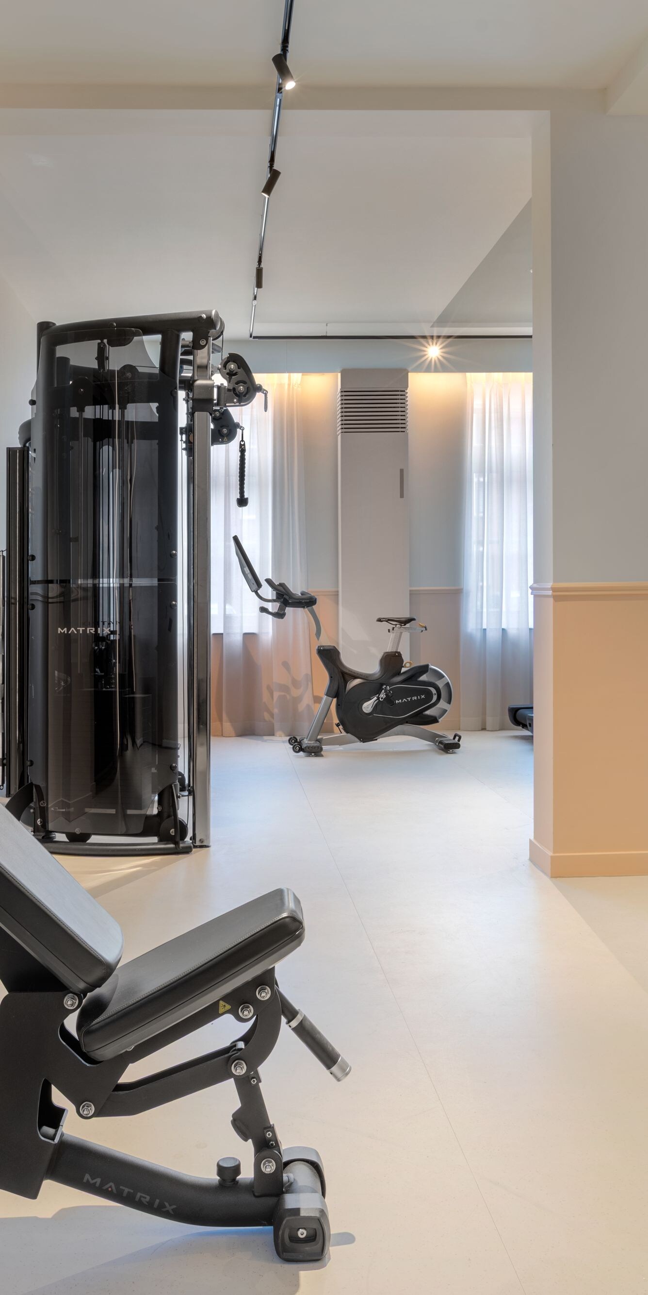 Hotel fitness room featuring exercise equipment