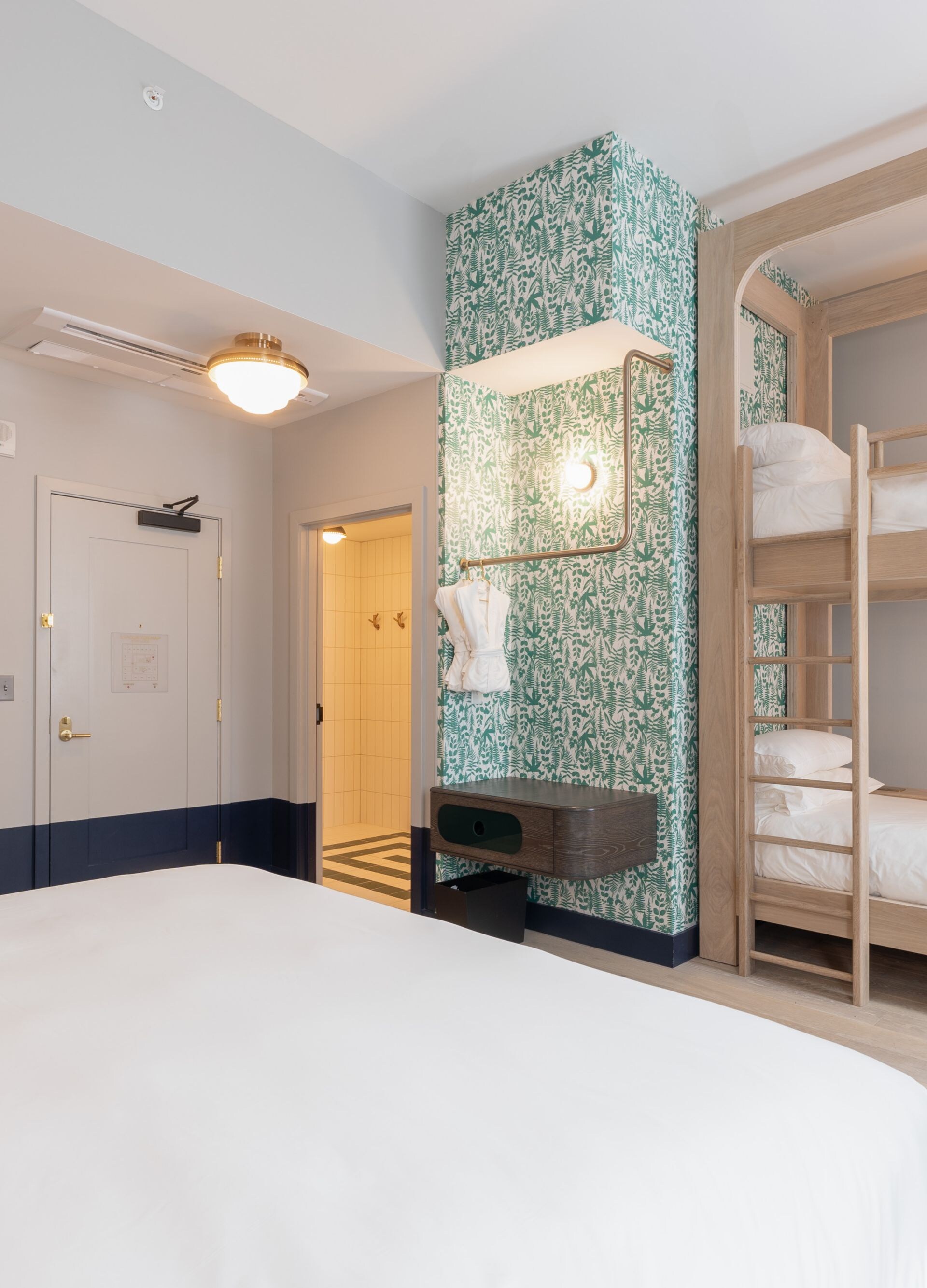 bed, bunk beds, mirror mounted to wall