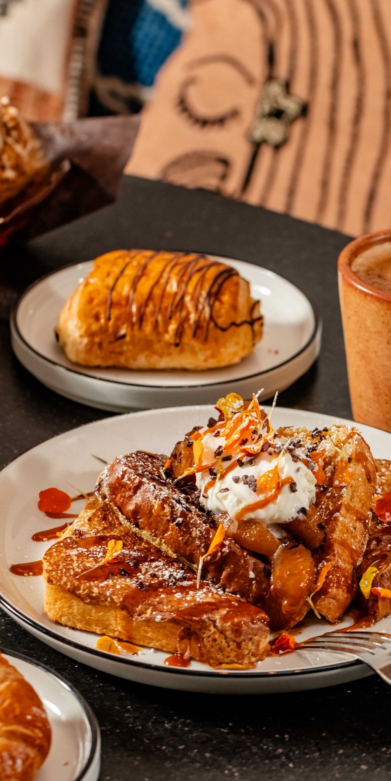 french toast, smoothie, latte, and pastries