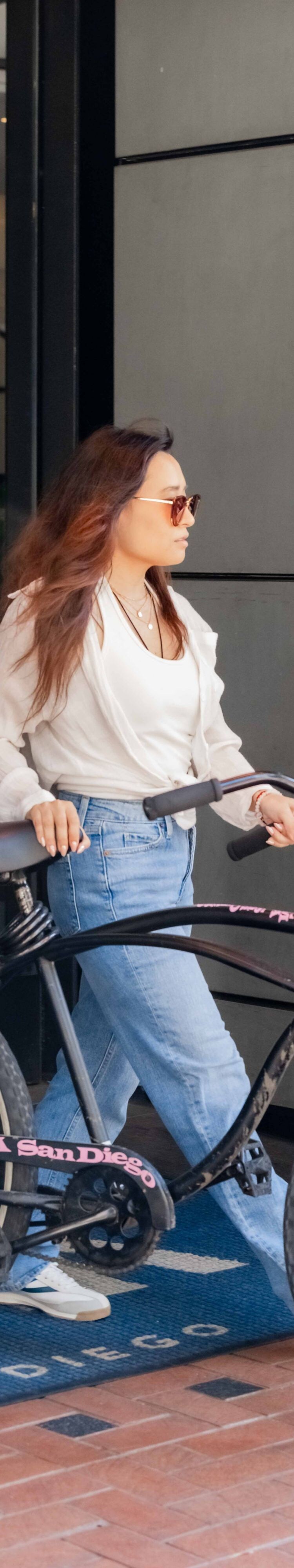 Hotel guest taking a bicycle outside
