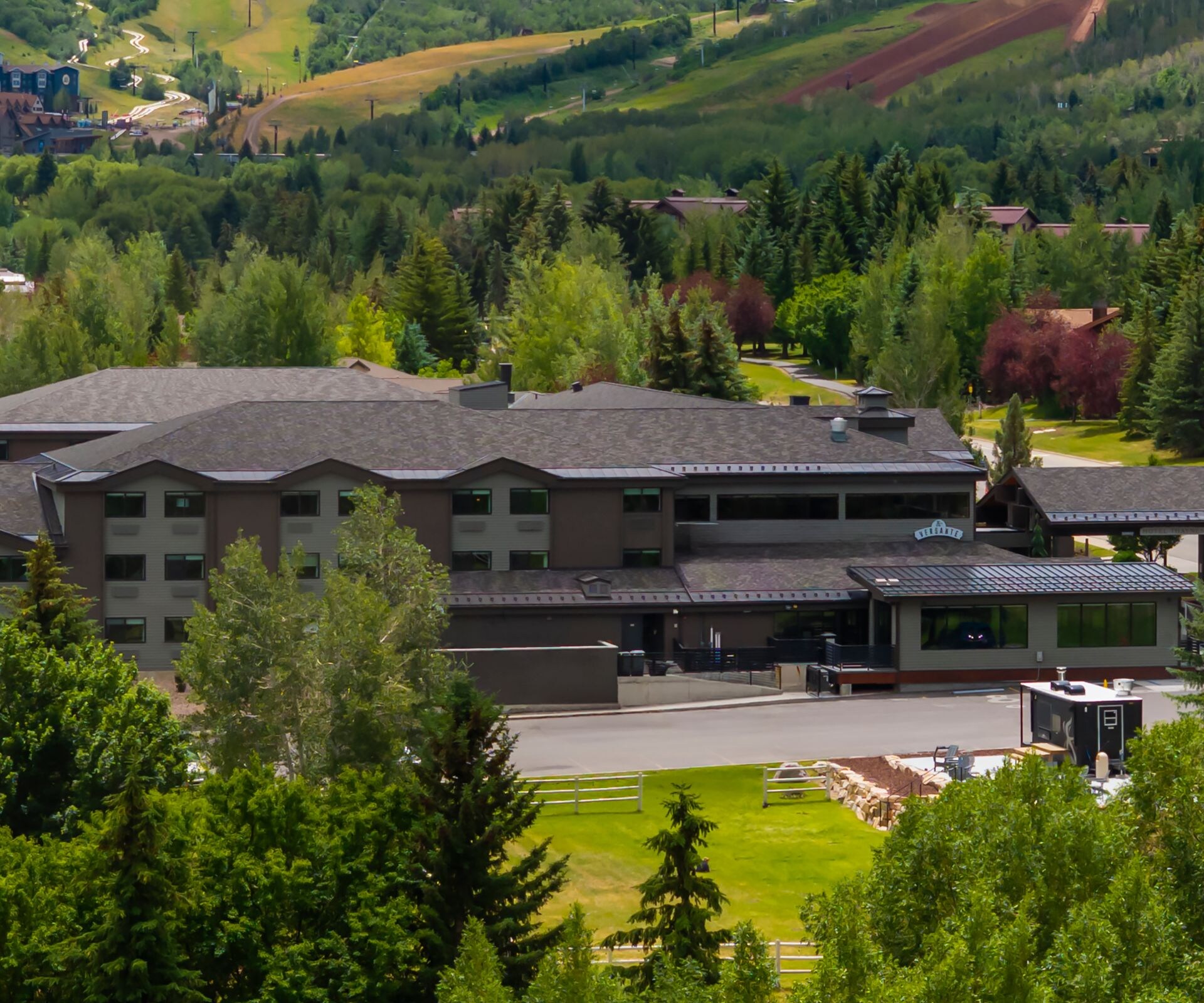 Exterior of hotel with Mountains, summer