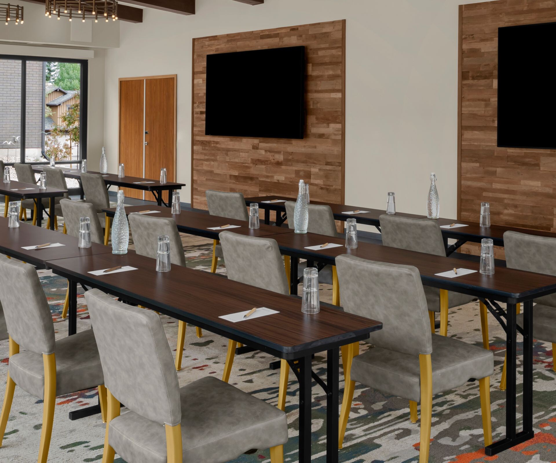 Meeting classroom setup with TVs
