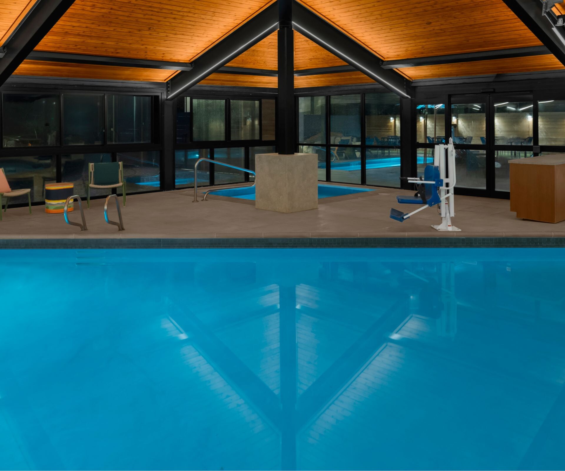 Indoor pool at night with lighting