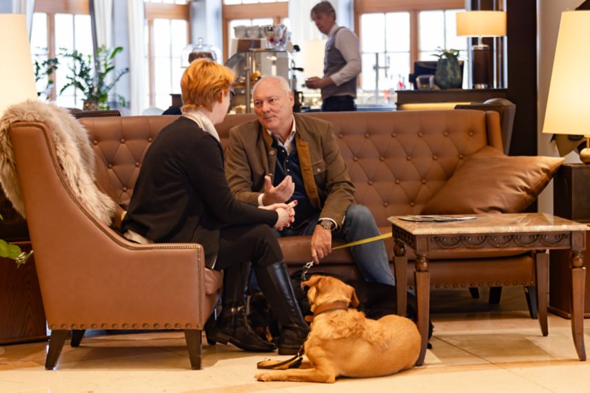 Couple and Dogs in the Lobby