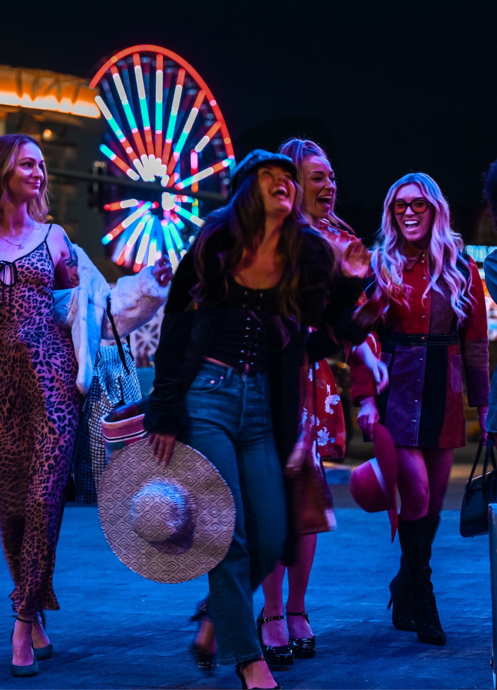 Ladies arrive at the hotel at night  for check in