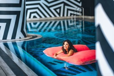 Woman in pool at W Brisbane