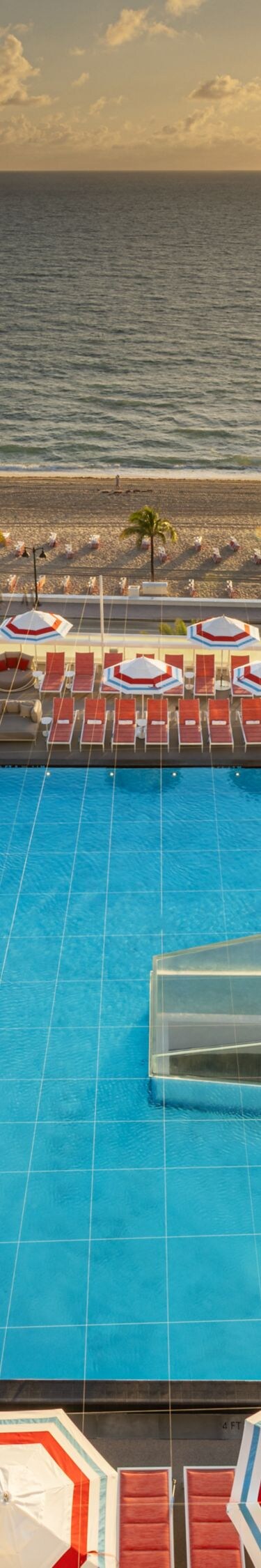 Pool at sunset with ocean view