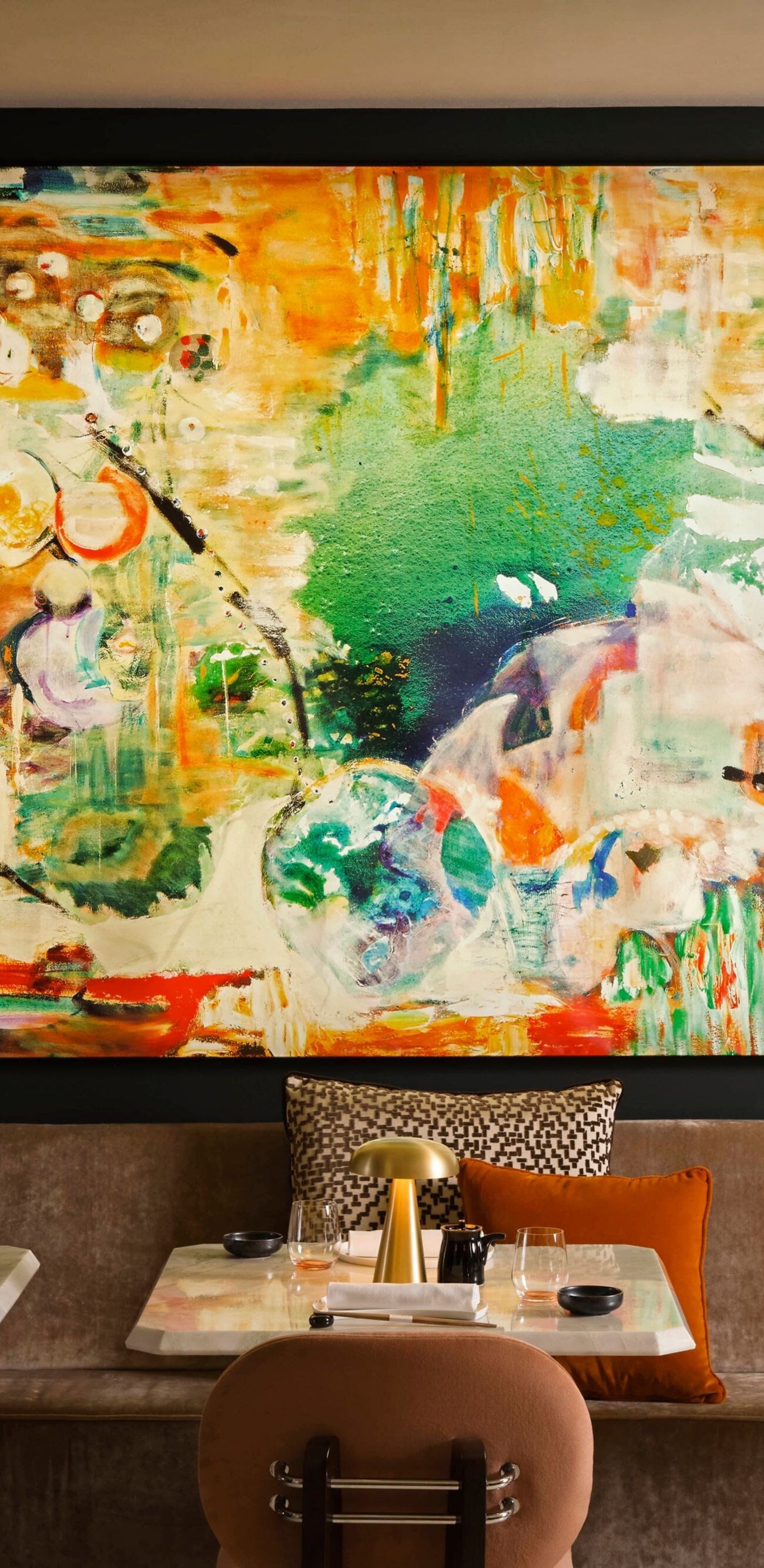 Dining area with colorful art Akira Back Florence