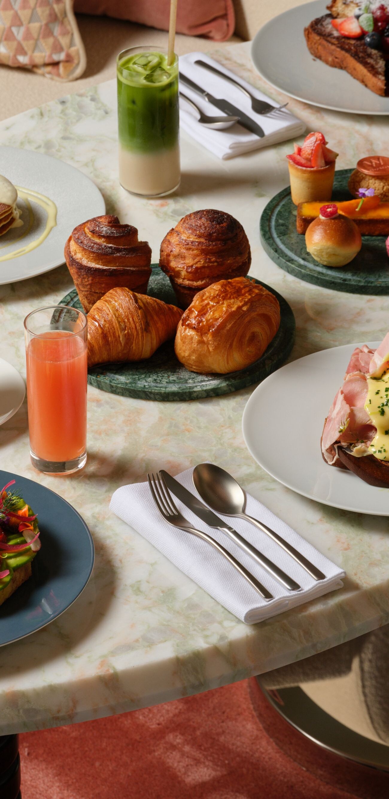 Table with breakfast options and a matcha