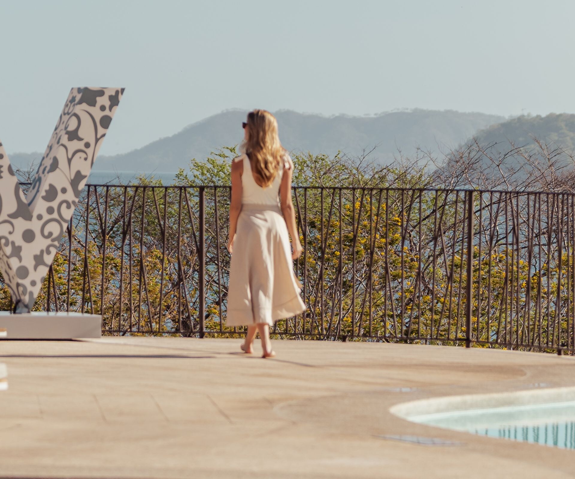Woman by the pool