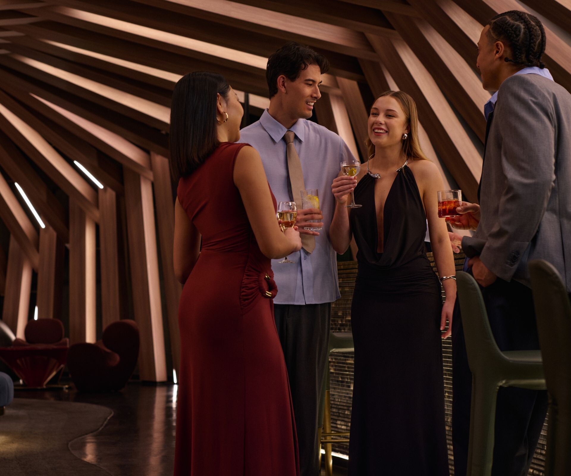 Guests enjoying cocktails at Curious