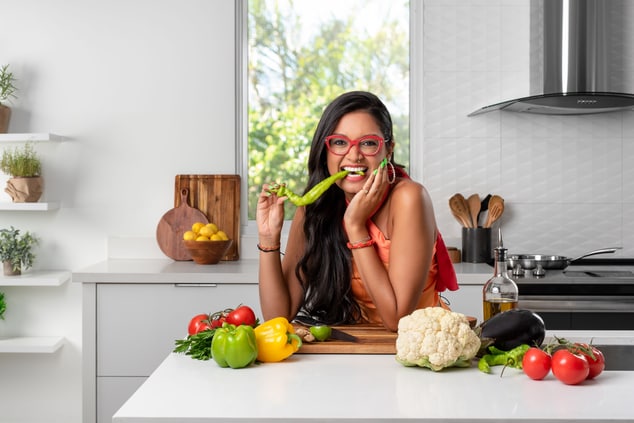 Woman eating veggies