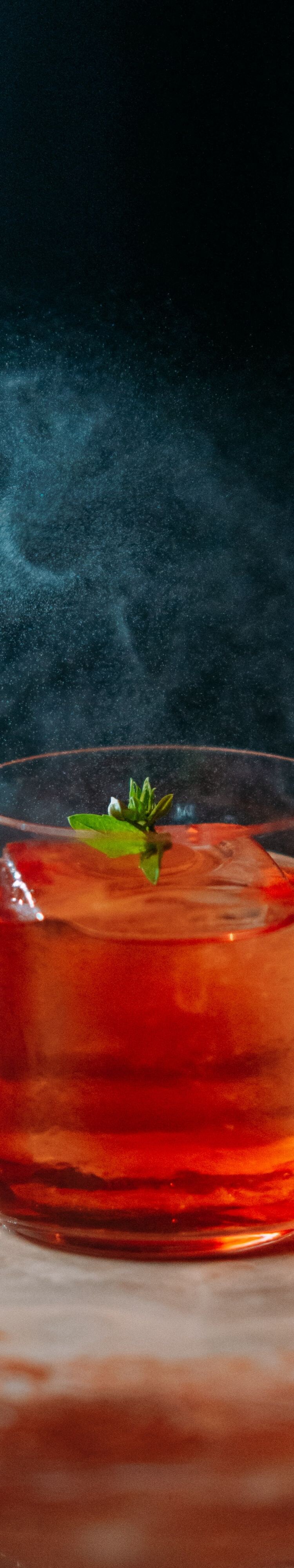 Negroni cocktail finished with aromatic mist