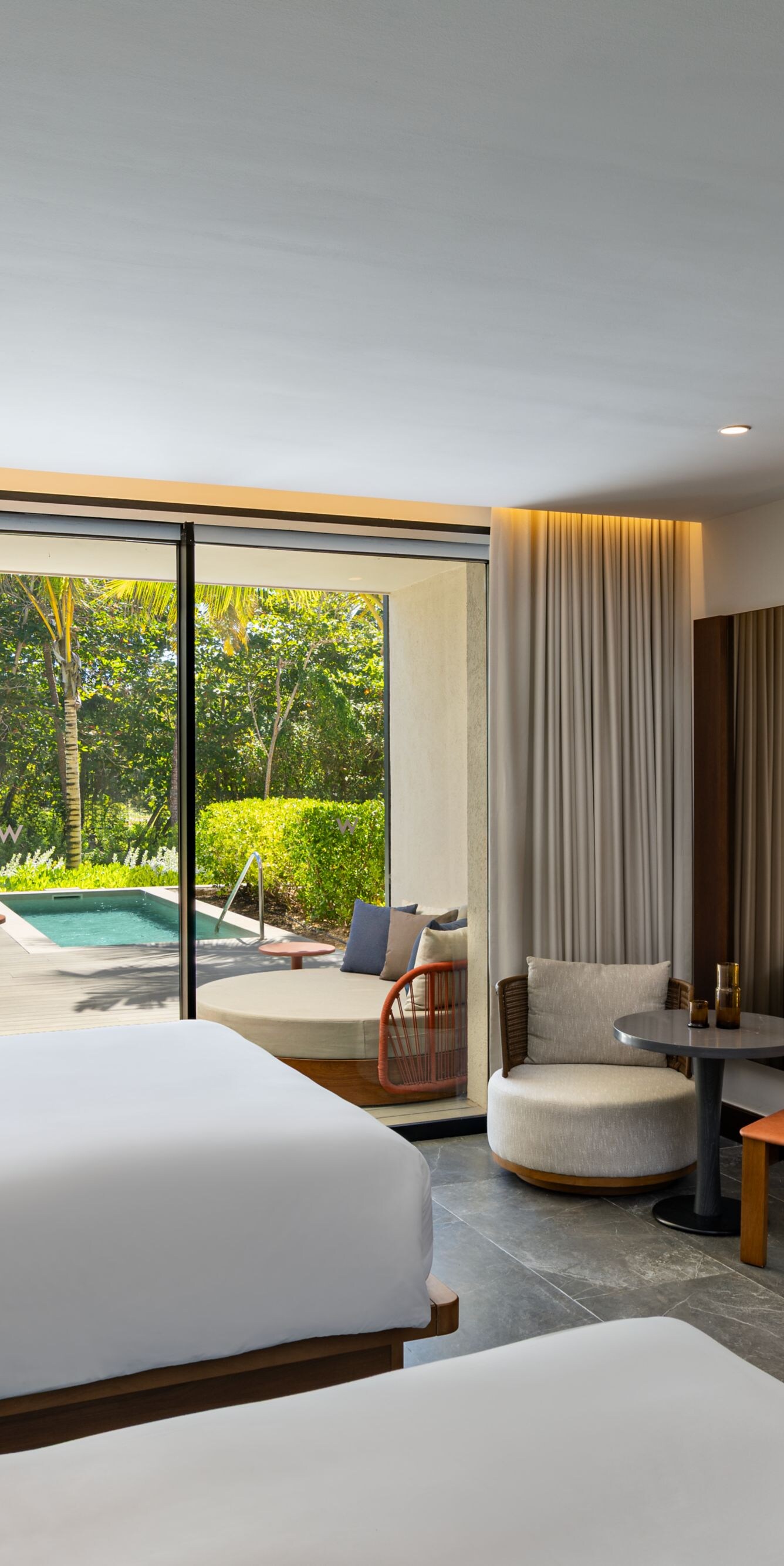 Suite Deluxe con dos camas tamaño King y piscina privada
