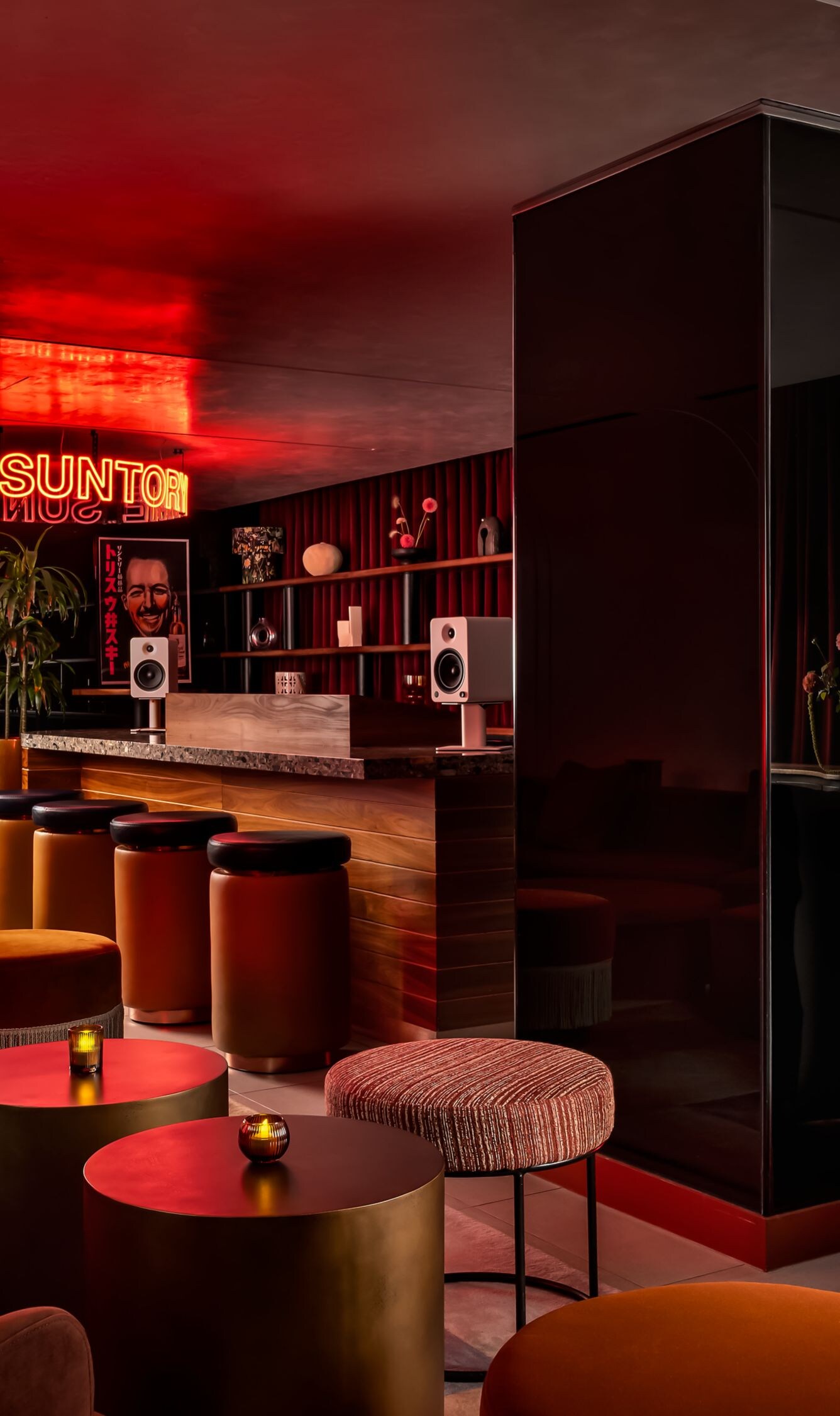 Modern lounge with red velvet seating