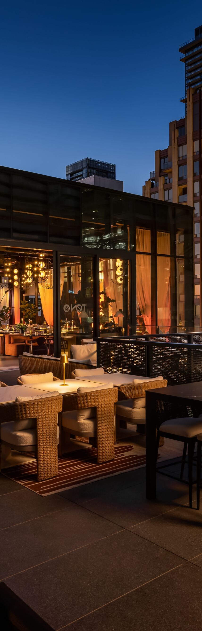 TONO by Akira Back patio at dusk