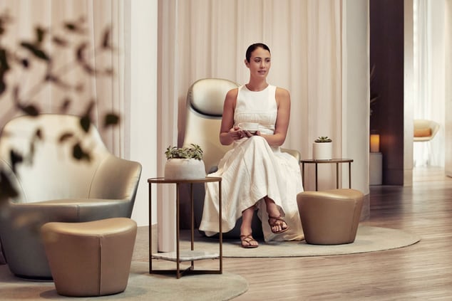 Woman sitting in the lobby of the spa