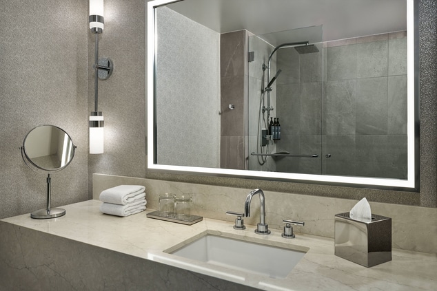 Bellevue hotel guest bathroom vanity with mirror a