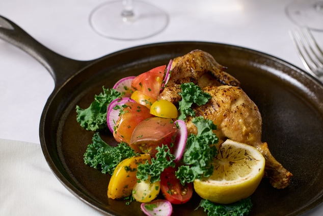 Roasted chicken with mixed tomato and radish salad
