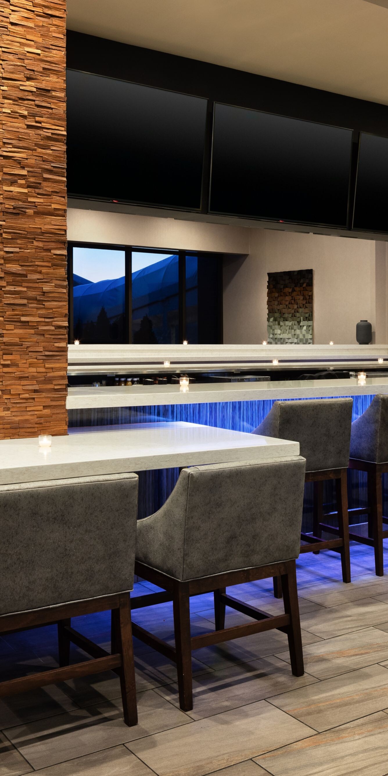 Hotel bar with seating and tables
