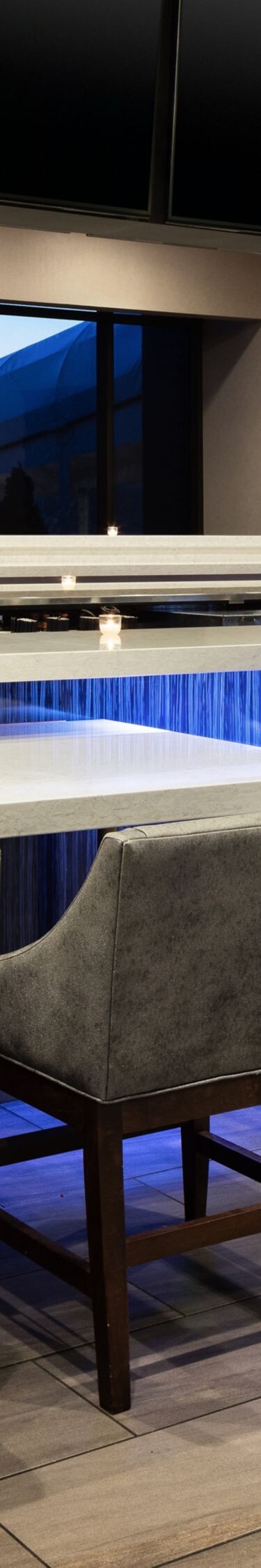 Hotel bar with seating and tables