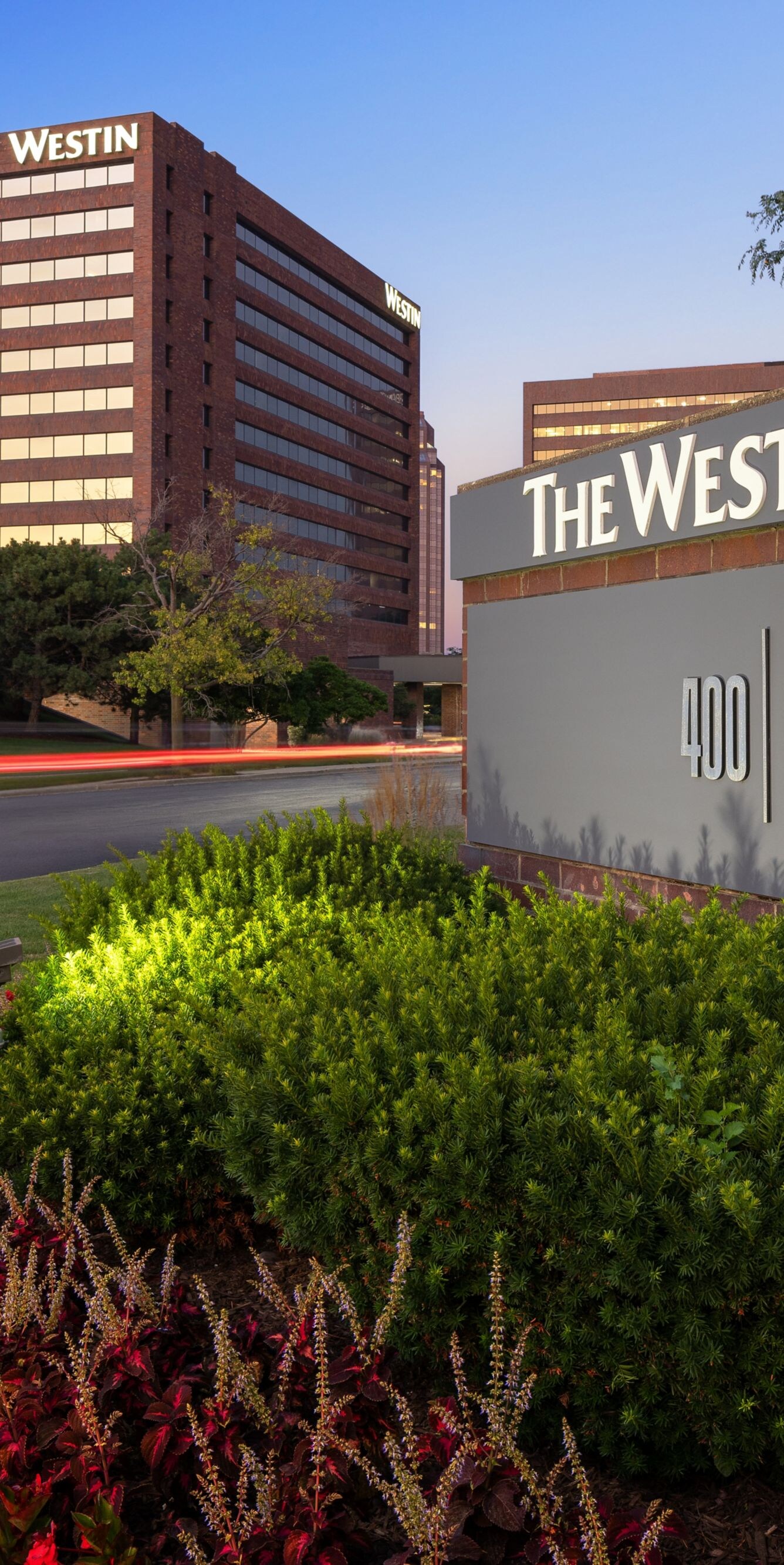 Property sign at hotel entrance