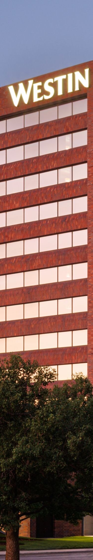 Hotel building illuminated at twilight