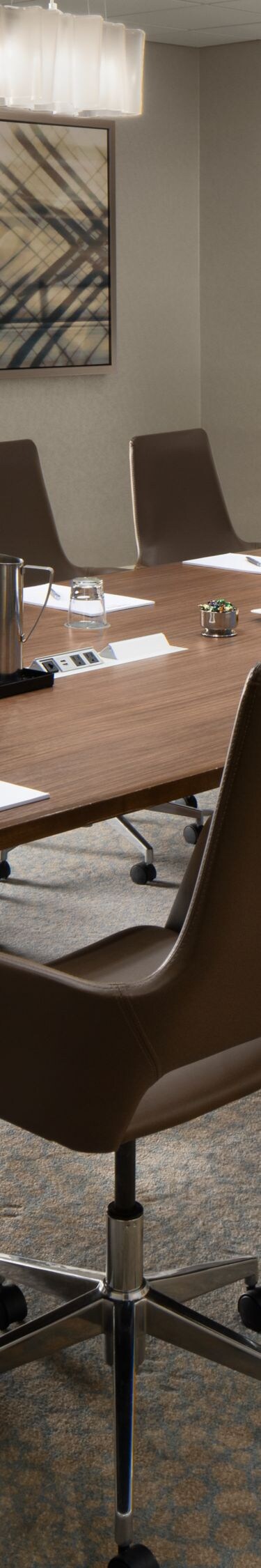 Hampton Meeting Room with a long table and chairs