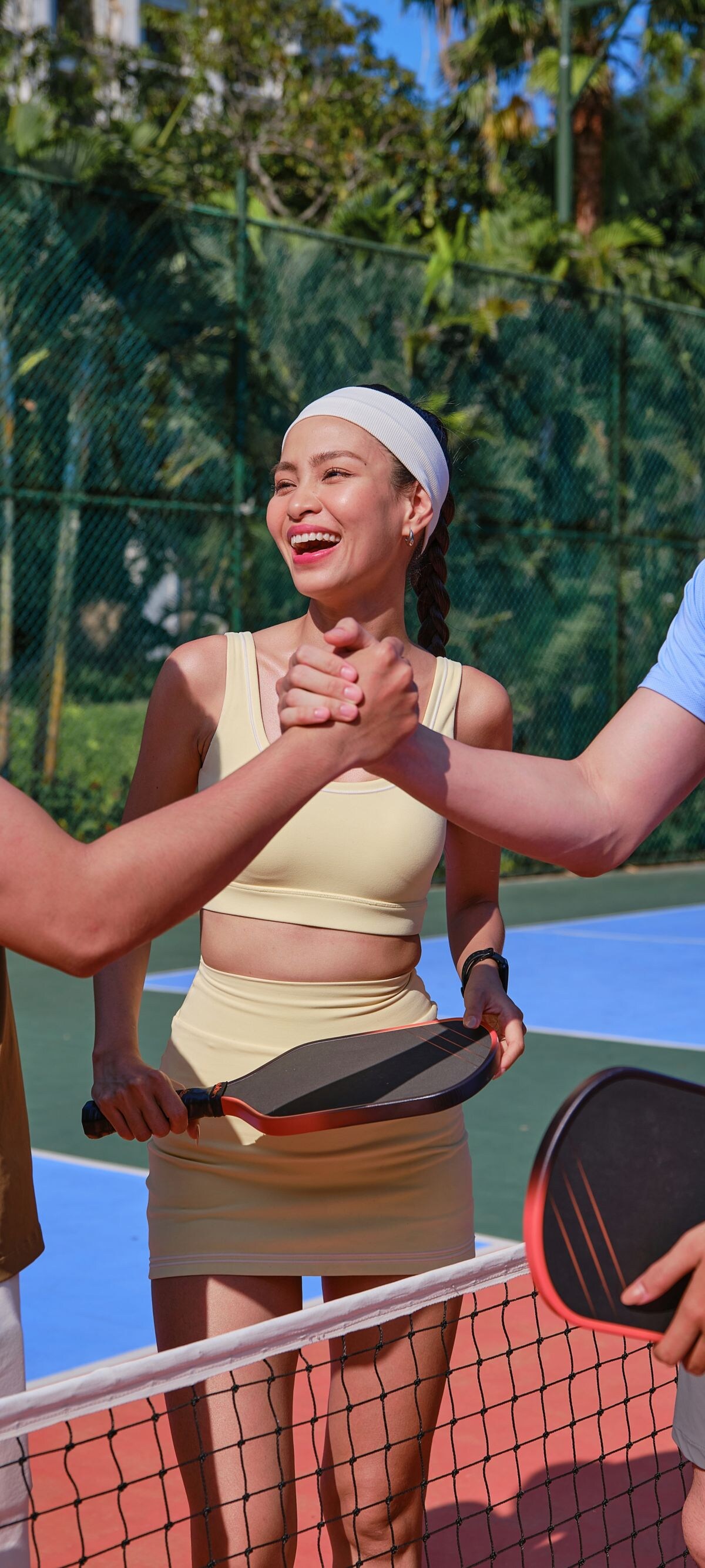 Friends Shake Hands at pickleball court