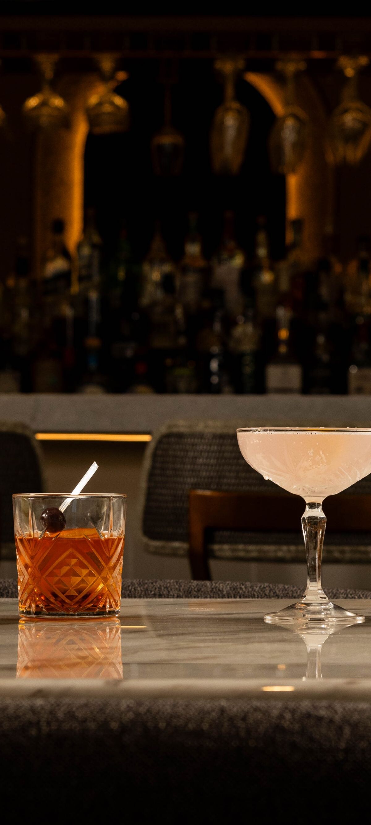 Tailored bar sign and cocktails on bar