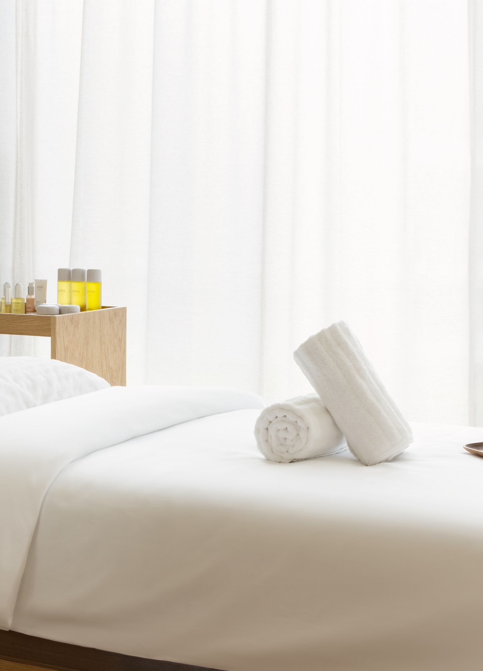 Close-up of massage bed and spa amenities at The W
