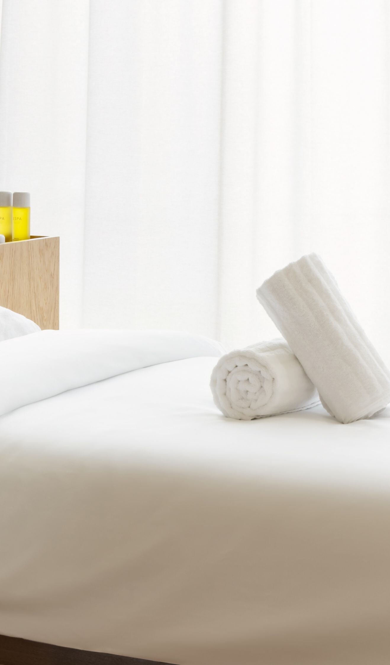 Close-up of massage bed and spa amenities at The W
