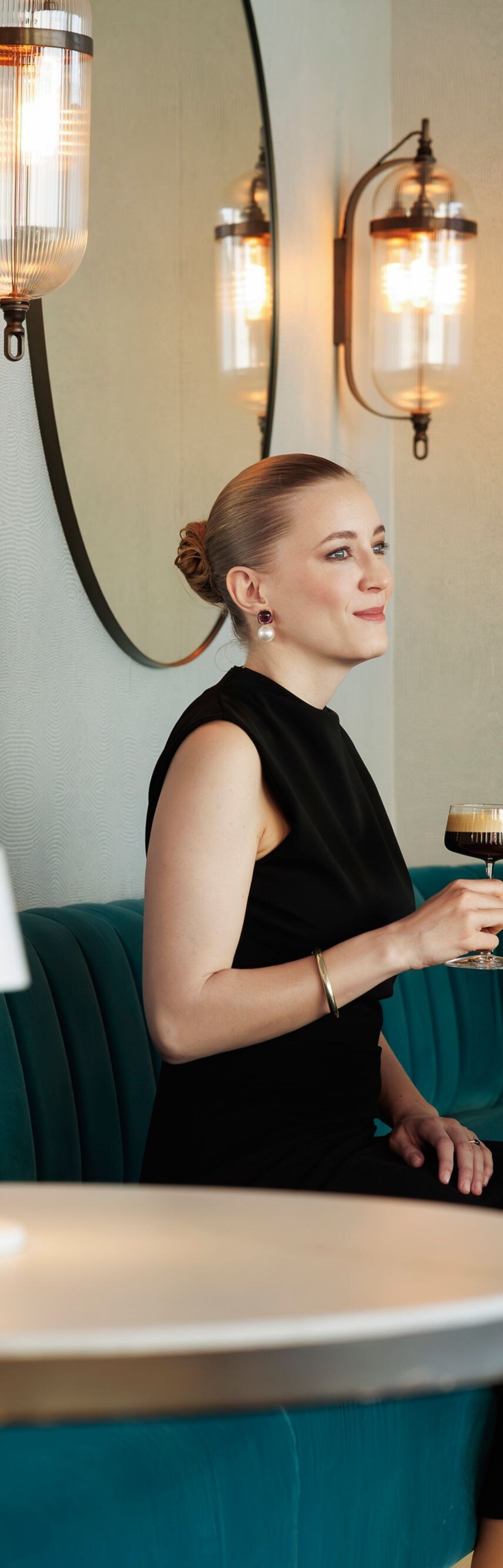 Couple in hotel bar with drinks