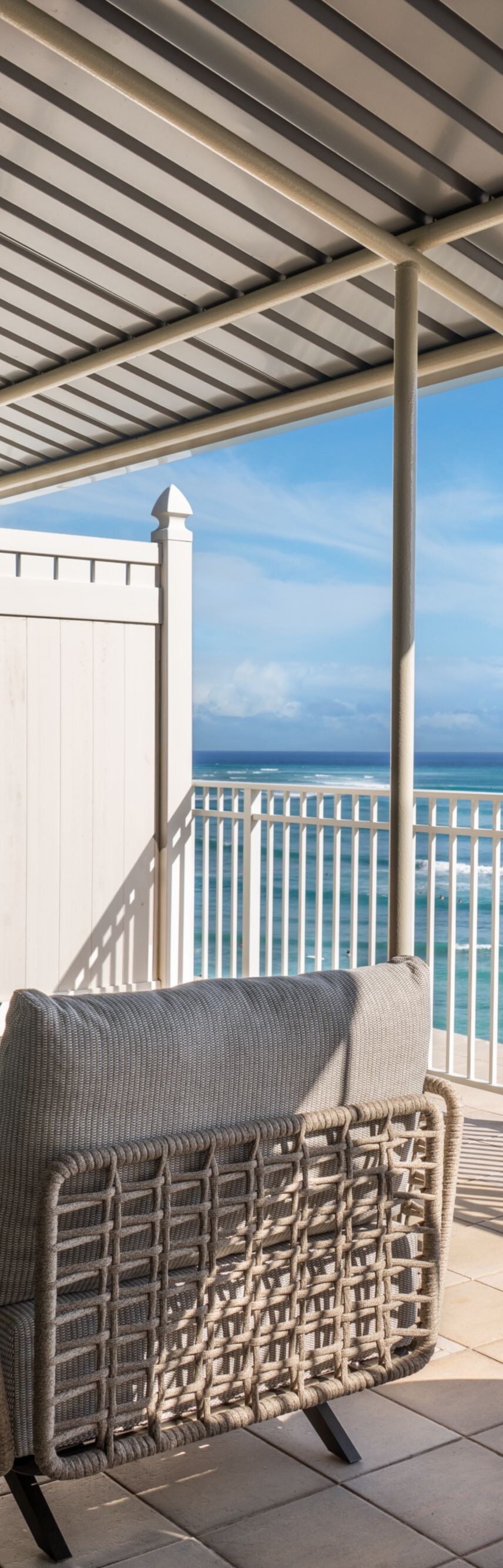 Oceanfront balcony with lounge seating