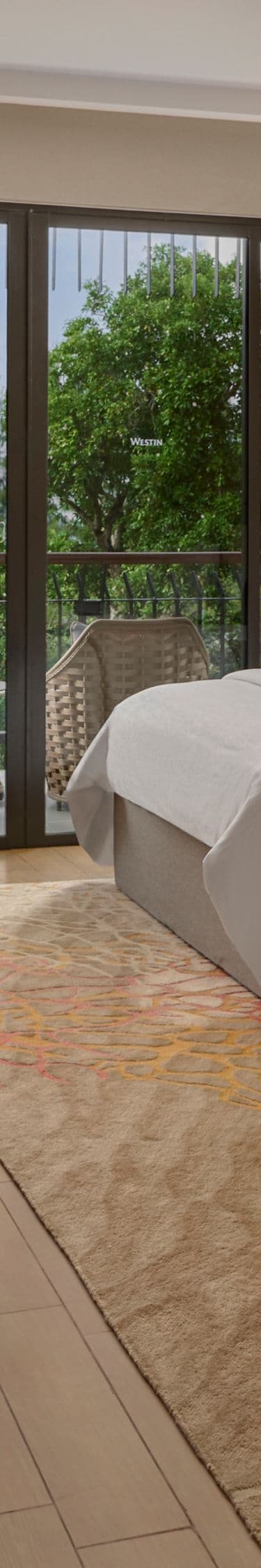 Guest room with two beds and balcony