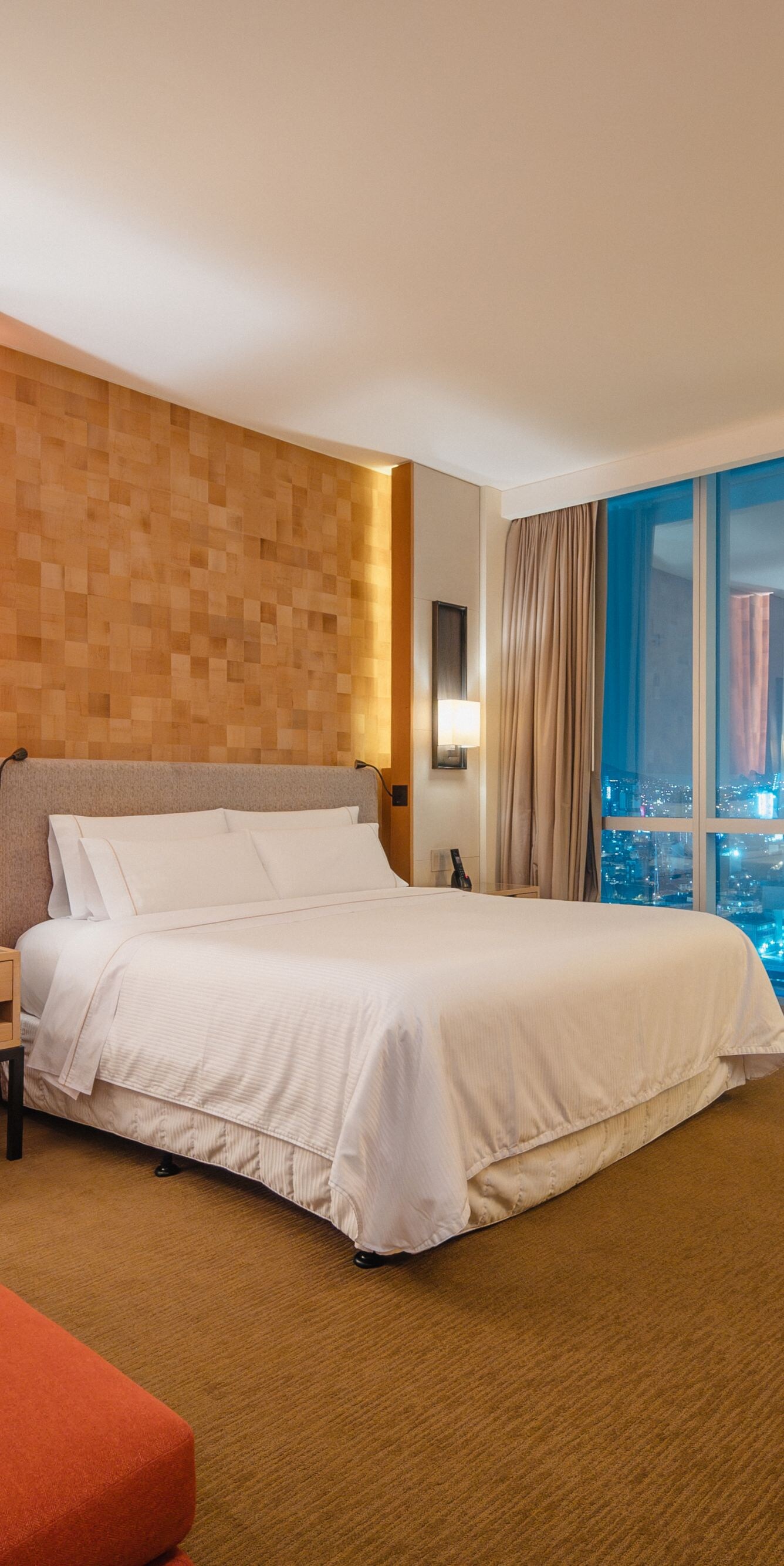 Suite bedroom with city views