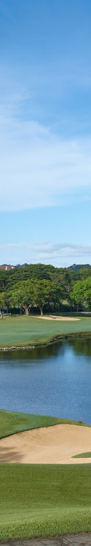 Golf course with water feature. 
