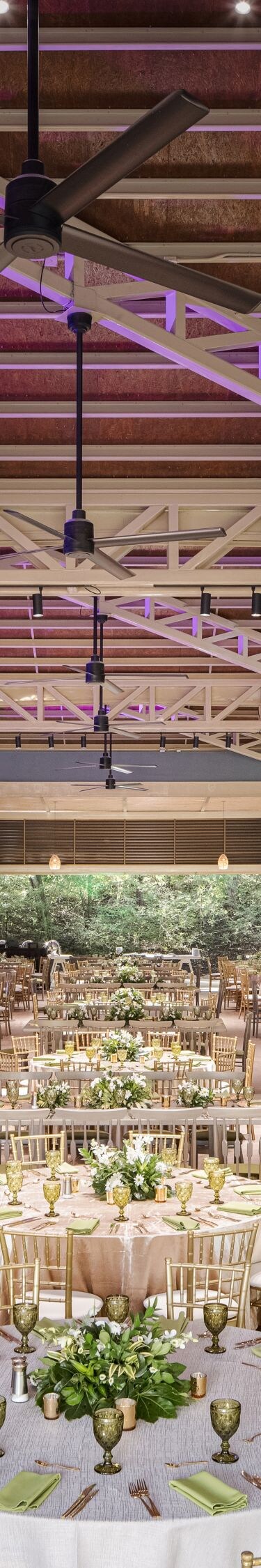 Large meeting space set with round tables