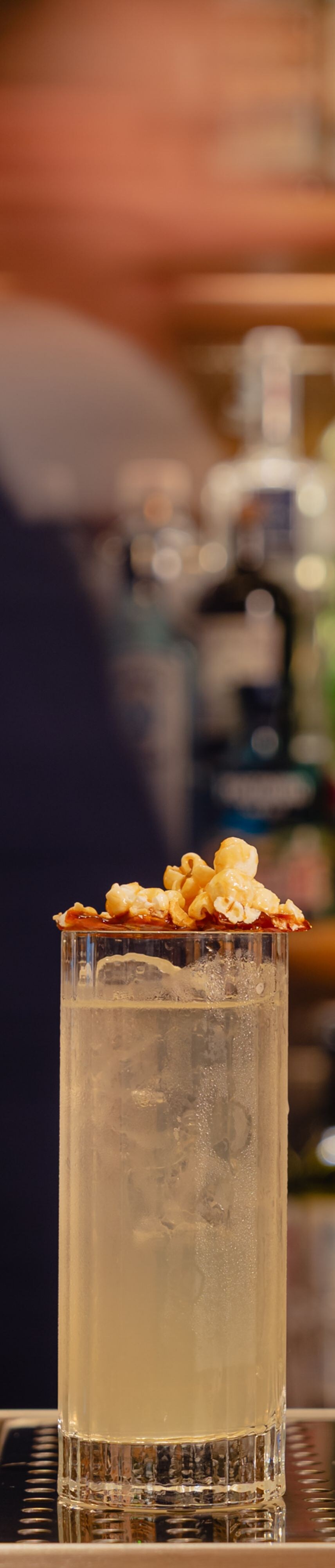 Bar countertop with garnished cocktail
