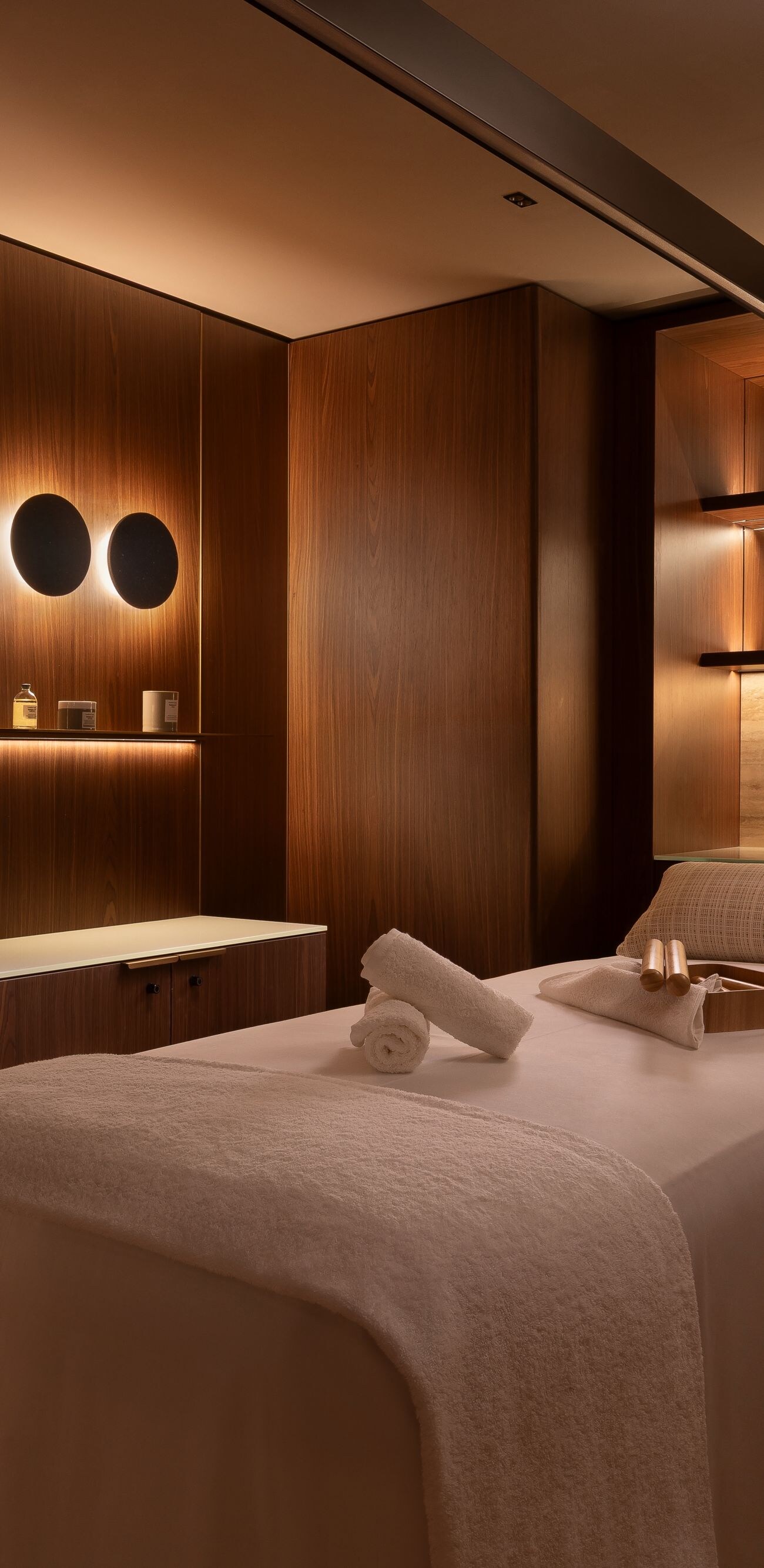Setup of treatment room with massage bed 