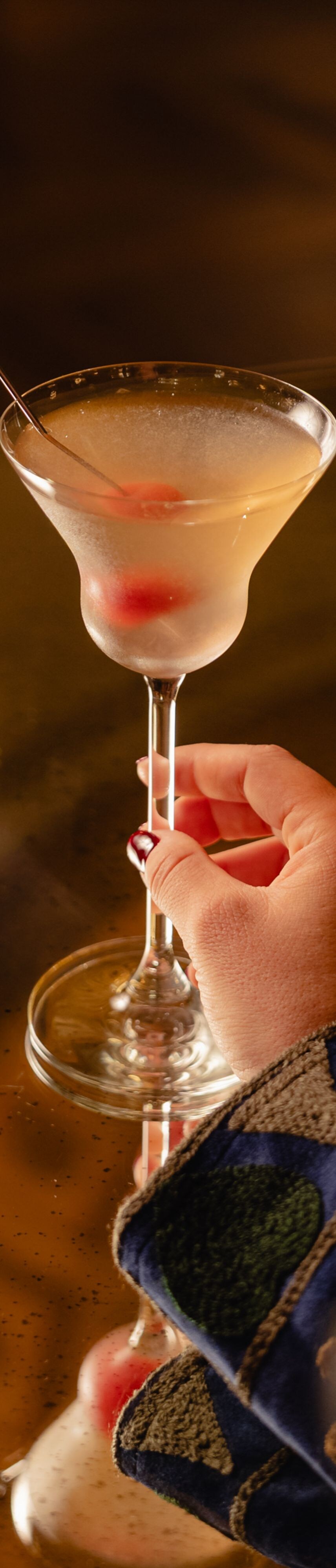 Client reaching for cocktail
