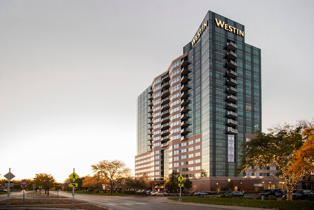 Exterior view of the Westin at dusk. 
