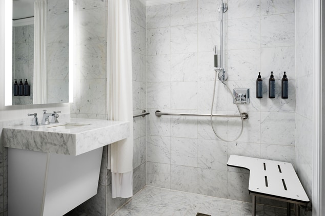 Bathroom with ADA-accessibility roll-in shower