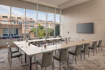 Ushape Table in meeting room with large windows