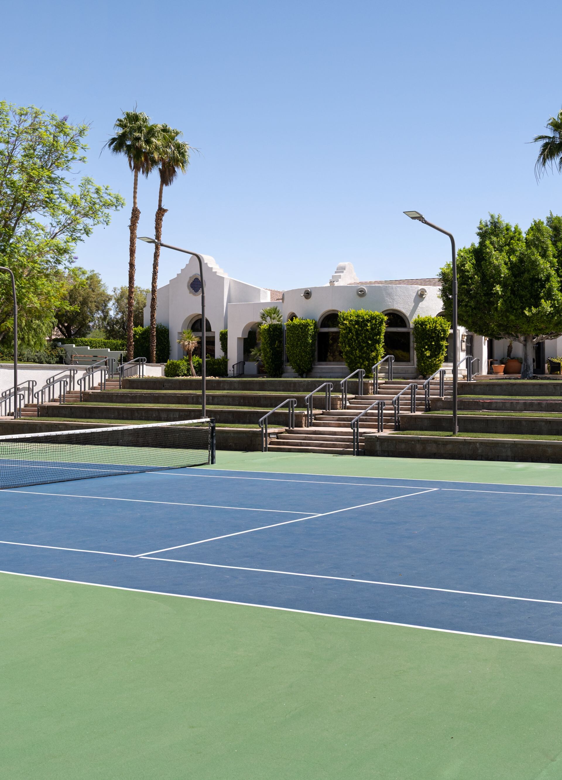 Rancho Mirage tennis court with palm trees 