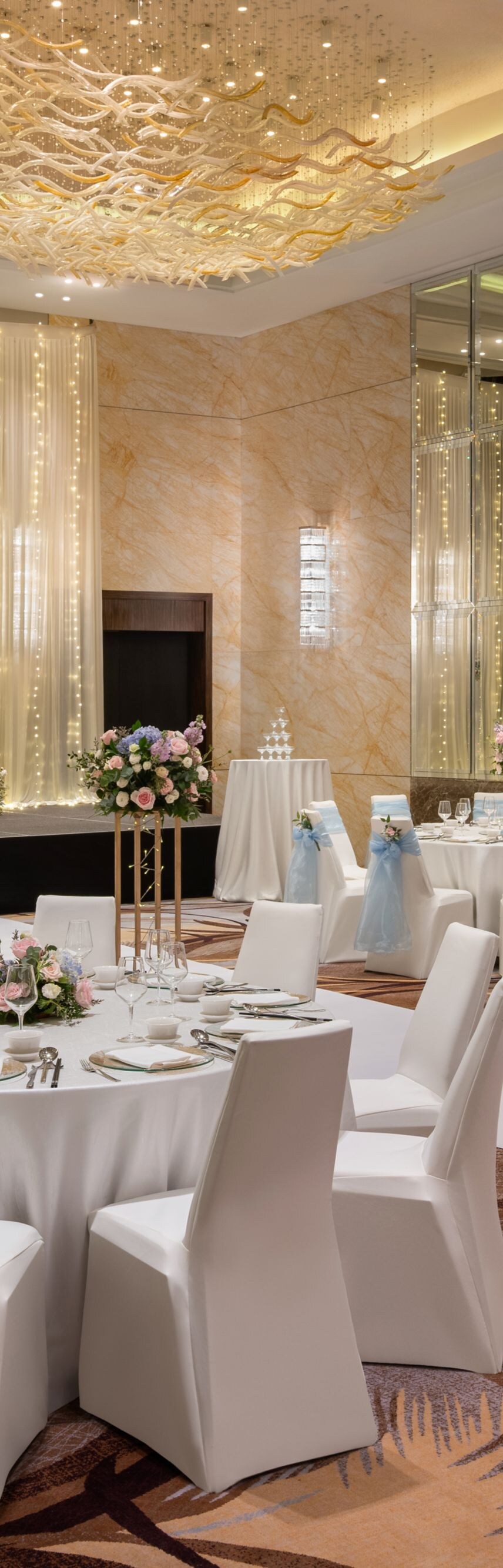 Ballroom wedding setup with banquet round tables