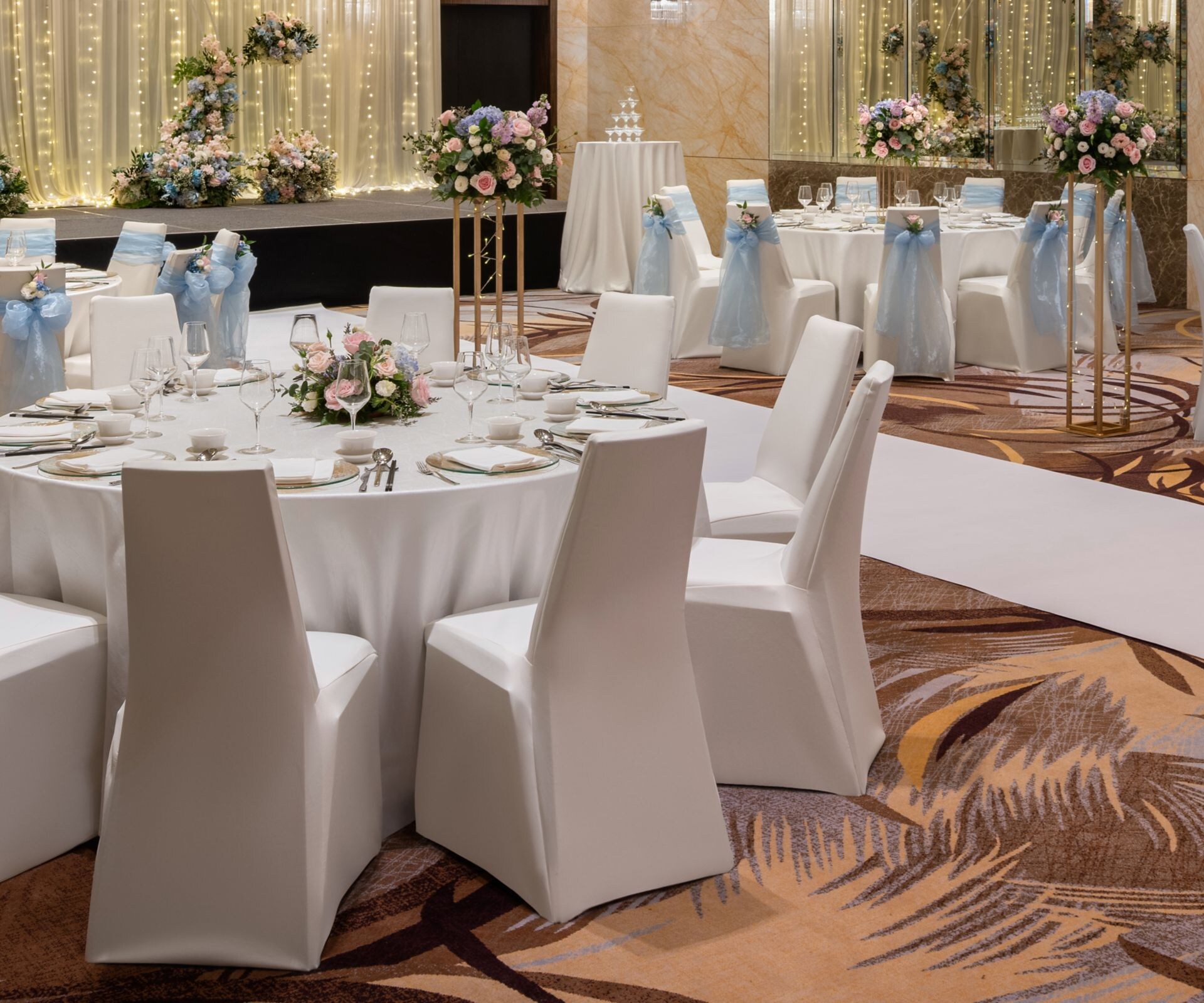Ballroom wedding setup with banquet round tables