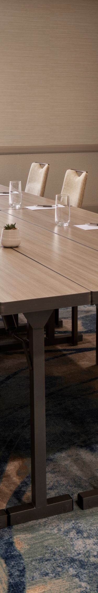 Private boardroom with conference table and servic