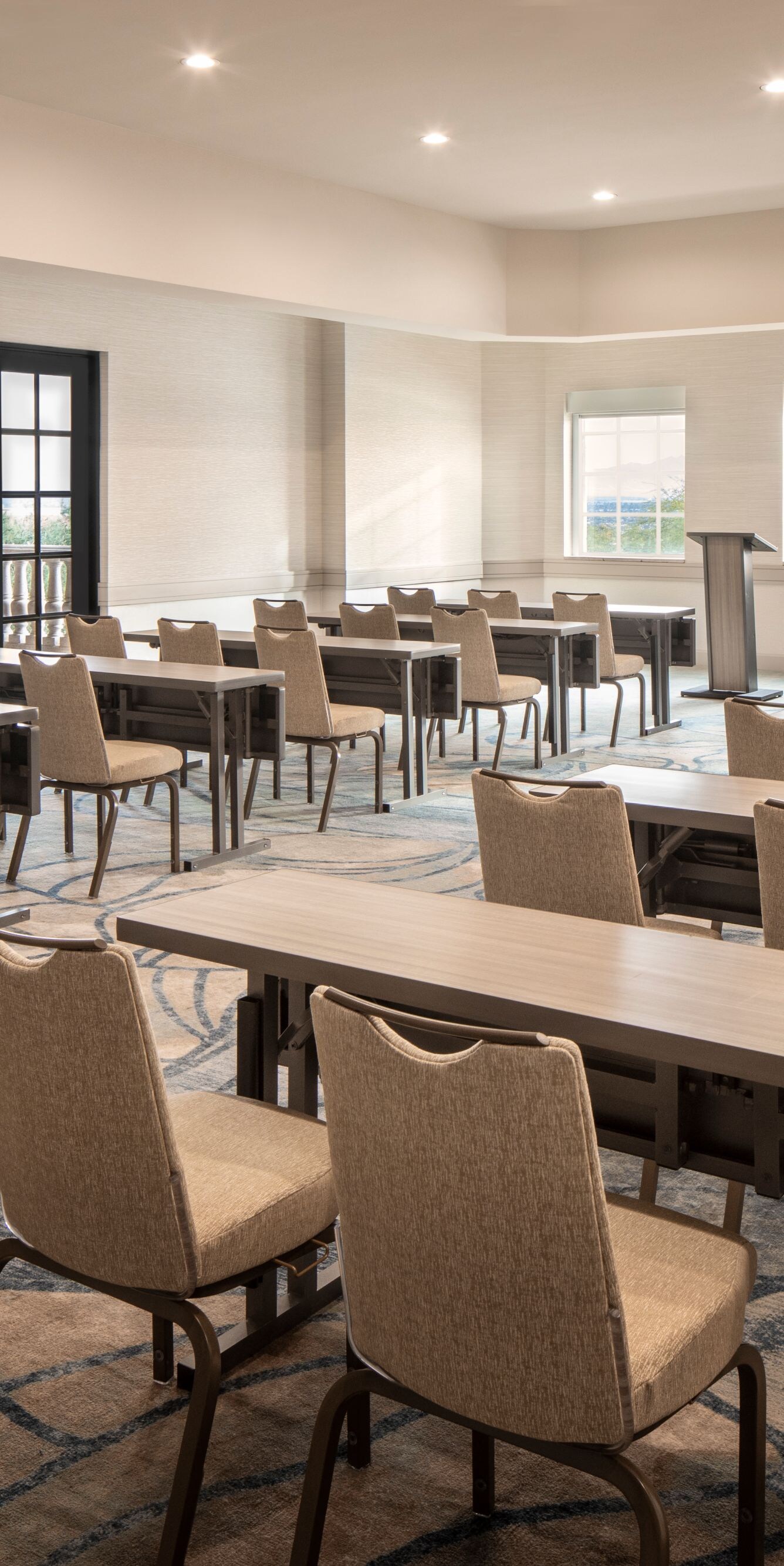 Conference room with classroom seating, projector